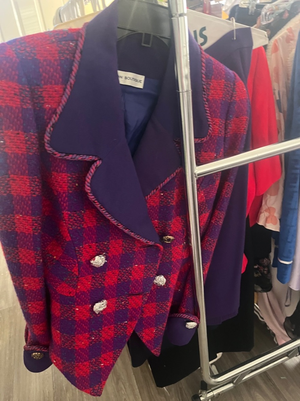 Nipon Boutique blazer and matching purple skirt